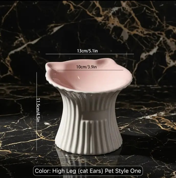 The Purr-celain ceramic cat bowl with a raised base and cat-ear rim