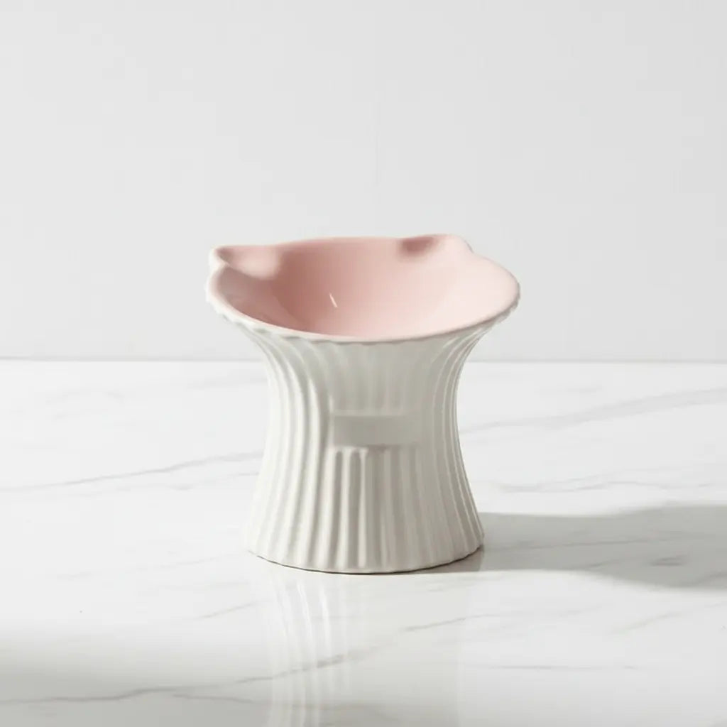 The Purr-celain elevated ceramic cat bowl with a sculpted cat-ear rim
