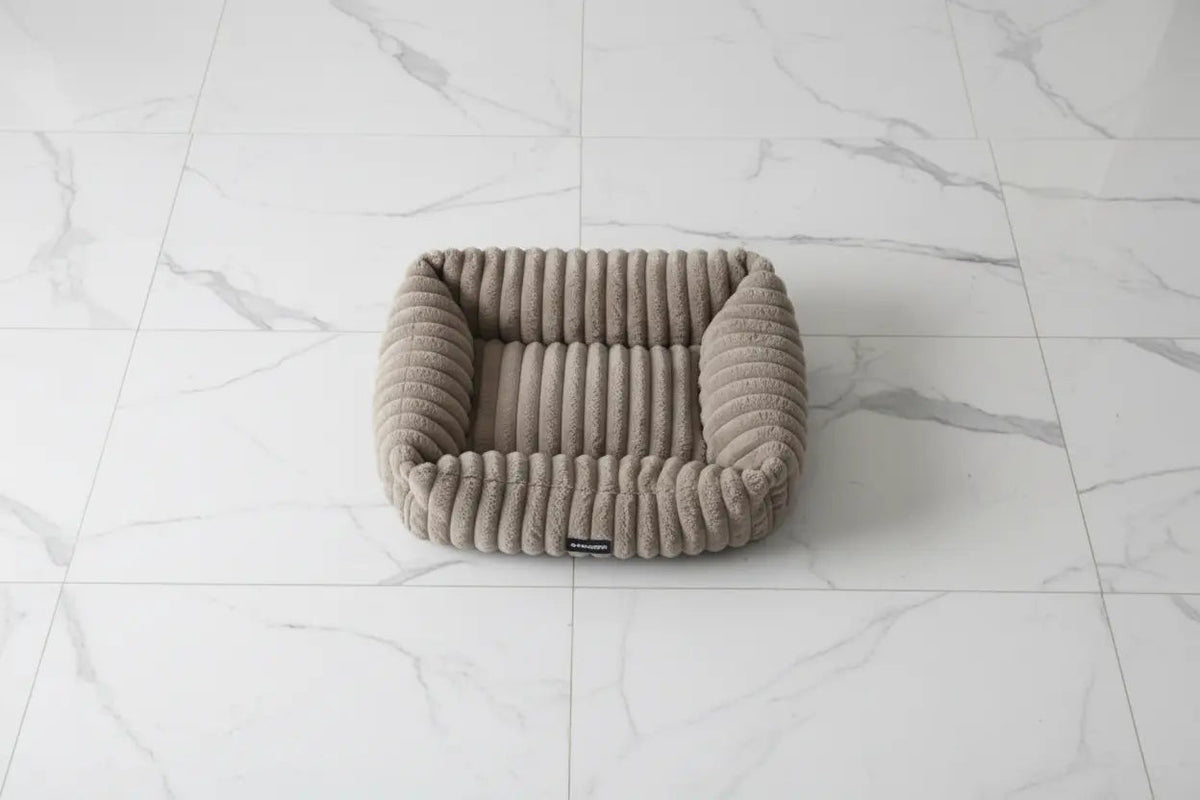 The Velvet Nest rectangular plush cat bed with raised sides