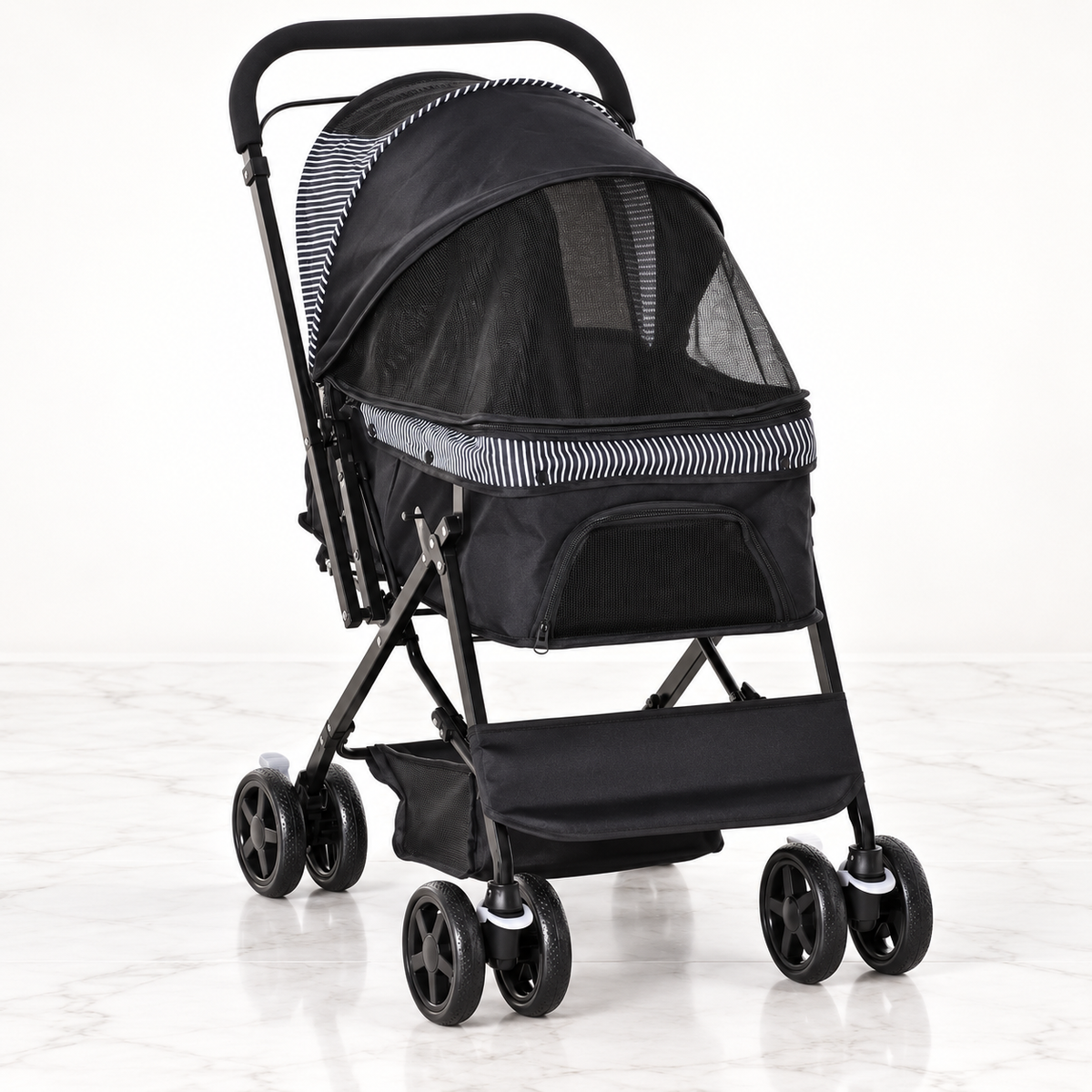 Black reversible-handle pet stroller on a light white marble background