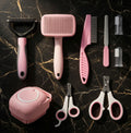 The Cashmere Comb 9-piece Maine Coon grooming set in blush pink
