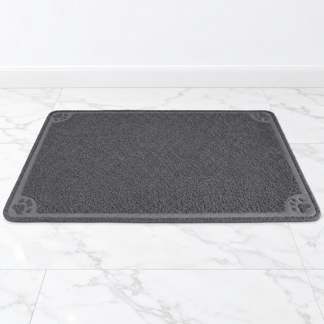 Extra-Large Litter Catcher Mat — 47 × 32 Inches on white marble