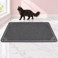 Extra-Large Cat Litter Mat 47 × 32 Inches – The Litter Landing with a black Maine Coon in a pale pink room