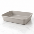 The Cabinet Fit 48cm compact cat litter tray on a light marble surface