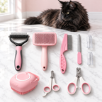 Maine Coon Grooming Set | Cat Brush & Comb – The Cashmere Comb in an empty light pink room with white marble flooring and a black Maine Coon looking toward the product.