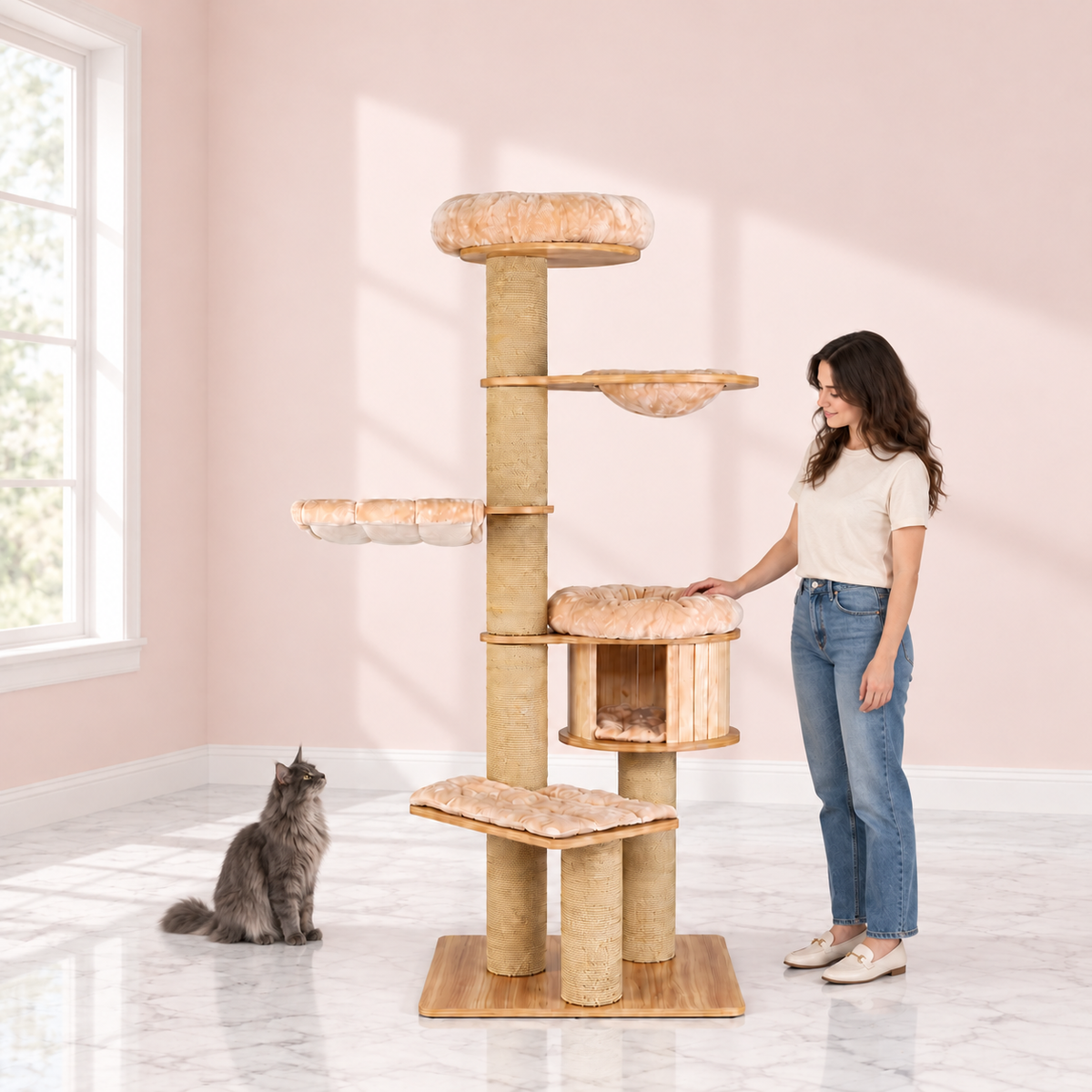 Wooden Cat Tree 191 cm – The Linden Lookout in an empty light pink room with white marble flooring and a smoky grey Maine Coon looking toward the product.