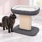 Plush Cat Bed & Sisal Scratcher – The Lowland Perch, Gray variant shown, with a black Maine Coon looking away from camera in an empty light pink room.