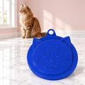 Pet Food Can Lid – The Pantry Seal, ASSORTED COLORS / ONE SIZE shown, with a ginger Maine Coon in an empty light pink room.
