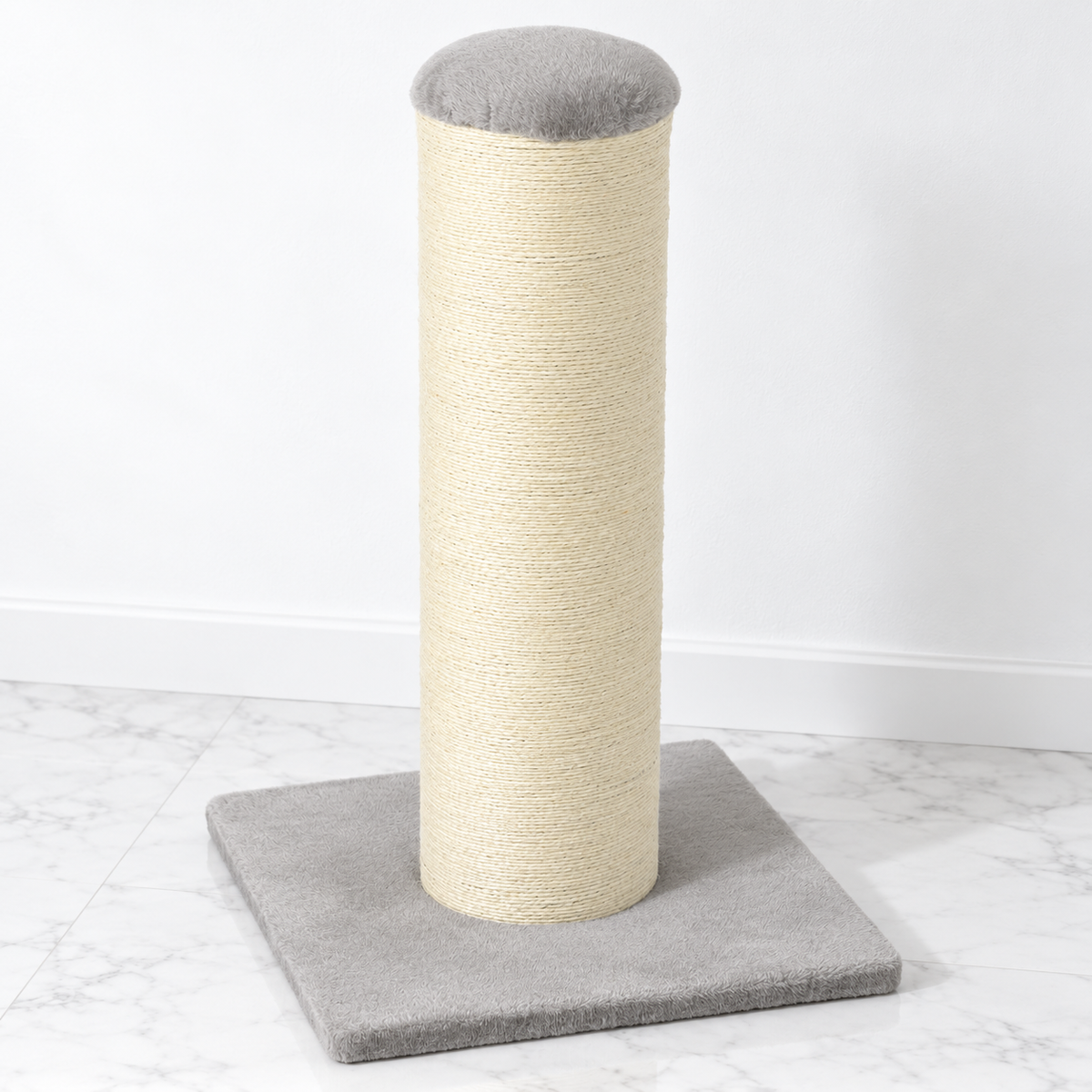 The Full Stretch light-grey 76 cm sisal scratching post on a white wall and light marble floor