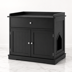 Black 76 cm litter cabinet with top drawer, two grooved doors and right-side cat entrance on a light marble studio floor