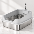The Silver Gallery grey high-sided stainless-steel litter tray on pale marble