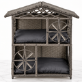 Grey two-storey wicker cat house with two removable cushions on a light marble background