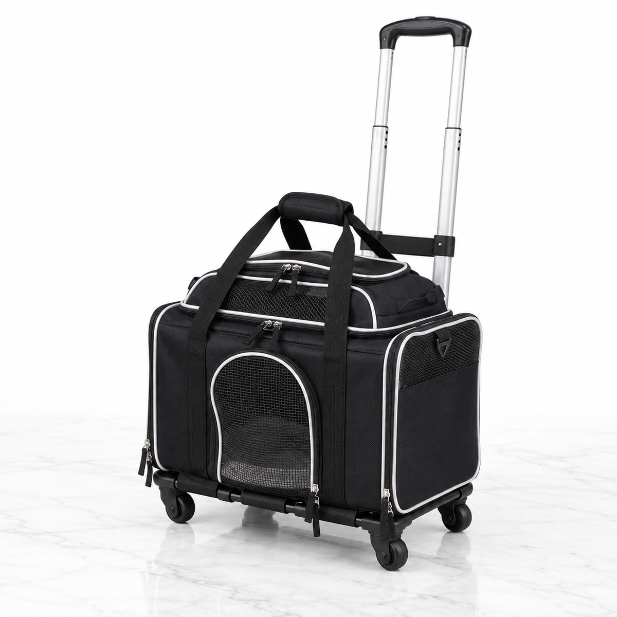 Black low-profile rolling pet carrier with silver piping on a light white marble background