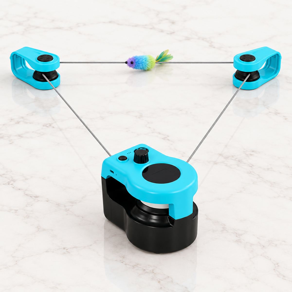 Turquoise and black configurable mouse-chase cat toy arranged as a triangular track on light marble
