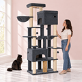 Maine Coon Cat Tree 185cm | Large Cat Tower – Taj-MeowHall in an empty light pink room with white marble flooring and a black Maine Coon looking toward the product.