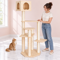 Pine-Wood Cat Tree – The Pinewood Lodge with a ginger Maine Coon in a pale pink room