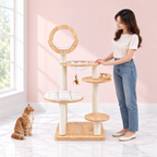Wooden Cat Tree – The Capsule Retreat with a ginger Maine Coon in a pale pink room