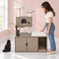 Cat Tree & Cat Litter Box Enclosure – The Tower Cabinet with a black Maine Coon in a pale pink room