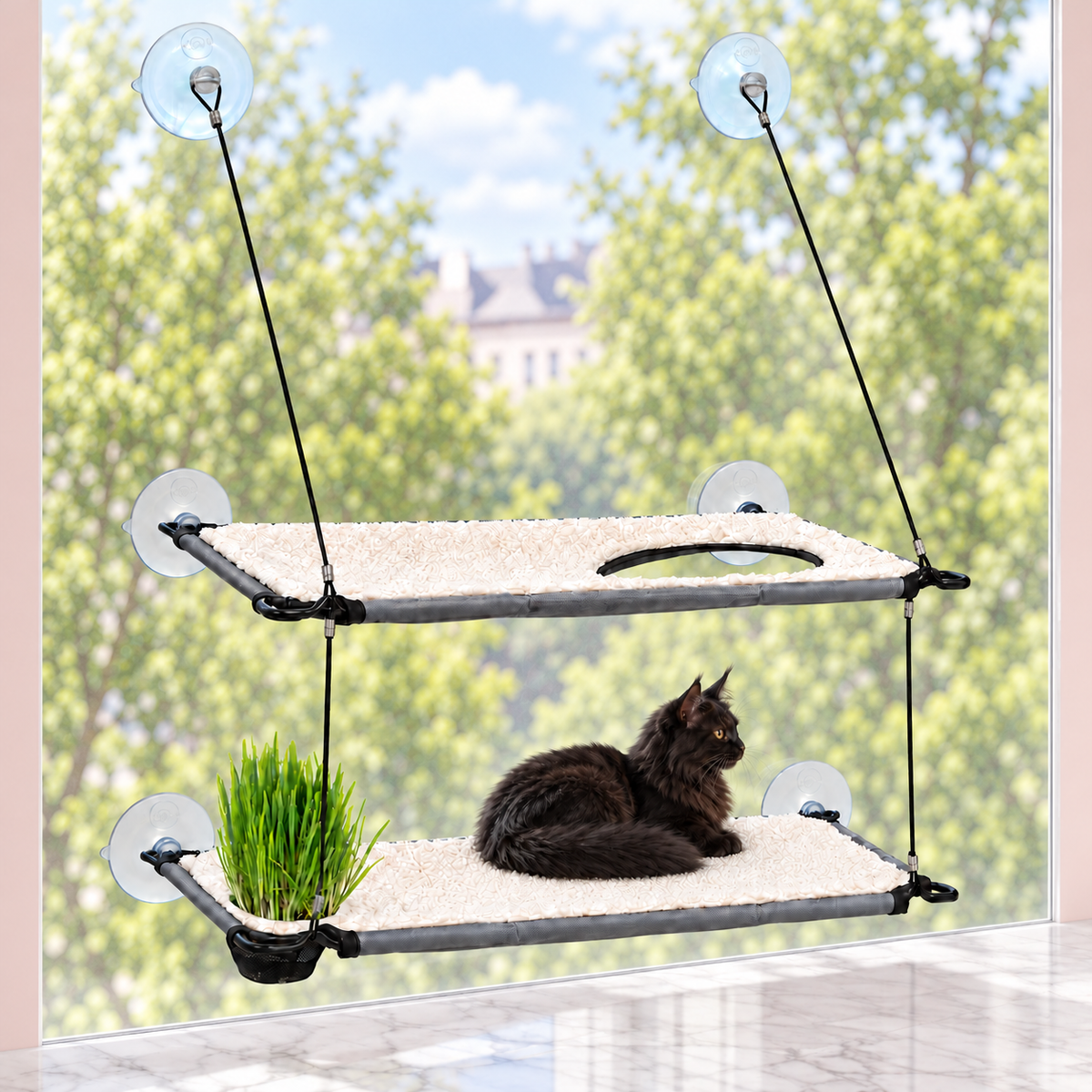 Window Lounger Cat Perch with Cat Grass Grow Station – The Garden Lounger with a black Maine Coon in a pale pink room