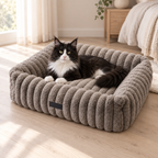 Generated scene of a black-and-white Maine Coon resting in a Velvet Nest bed